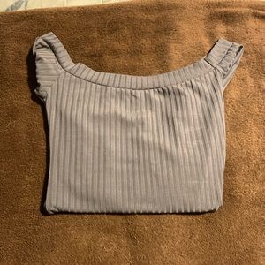 Women’s size S, off the shoulder long sleeve top.